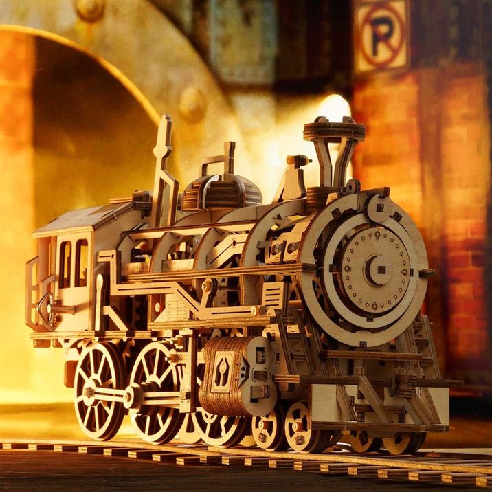 Un modèle de puzzle en bois 3d représentant un train à vapeur dans un tunnel.