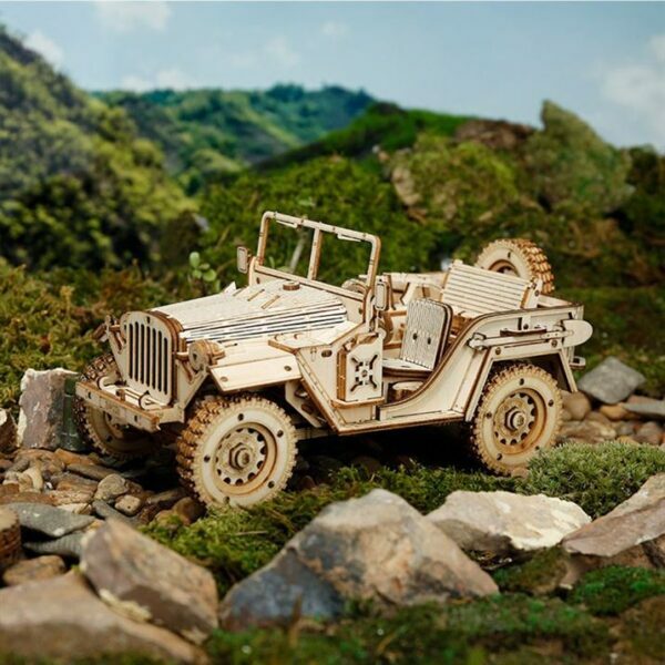 Un modÃ¨le de puzzle en bois 3d reprÃ©sentant une jeep sur des rochers par rokr.