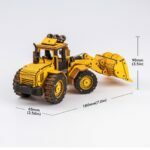 Un puzzle 3D en bois d'un bulldozer jaune avec des mesures.